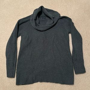 Medium, loose turtle neck sweater, soft stretchy cotton, blueish gray color.